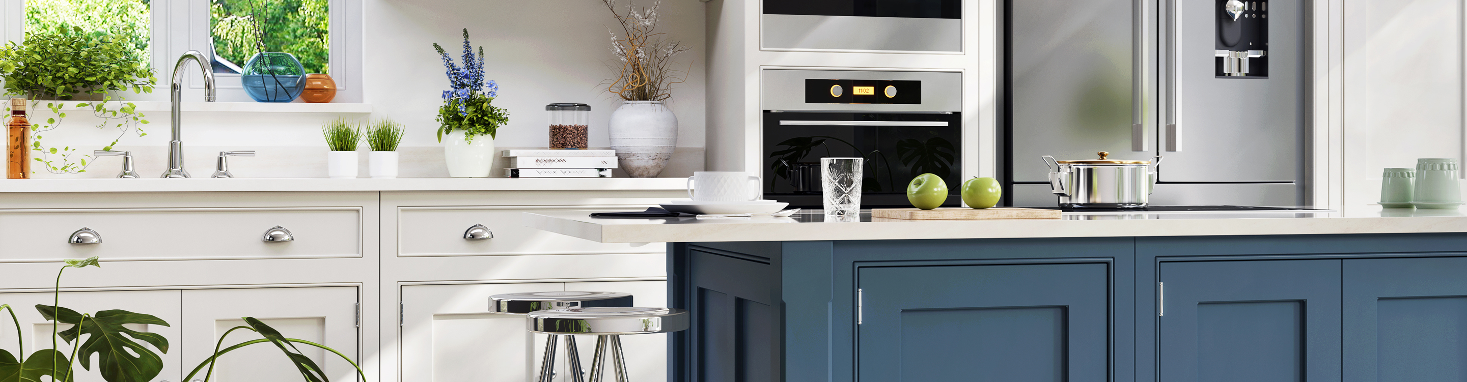 white kitchen cabinets with blue island in kitchen with black and white tile